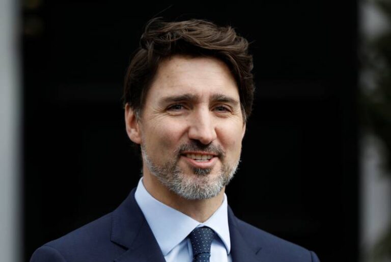 Prime Minister Justin Trudeau speaks with British Columbia Premier John Horgan