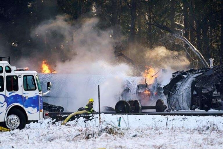 Train cars carrying crude oil derail, burn north of Seattle