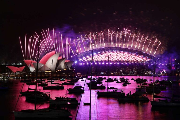 ‘I will survive’: 2020 slinks off into history as fireworks light deserted streets