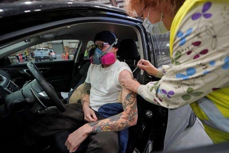 Calls to reopen classrooms grow as teachers get vaccinated