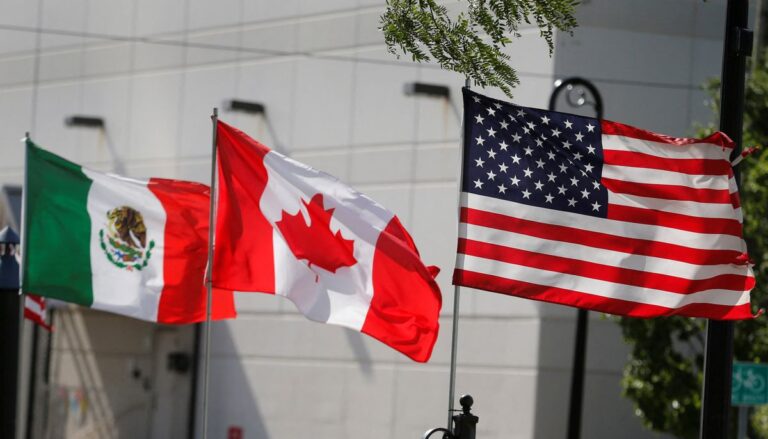 Flags of the United States, Canada and Mexico fly next to each other in Detroit, Michigan, U.S. on August 29, 2018. REUTERS/Rebecca Cook/File Photo