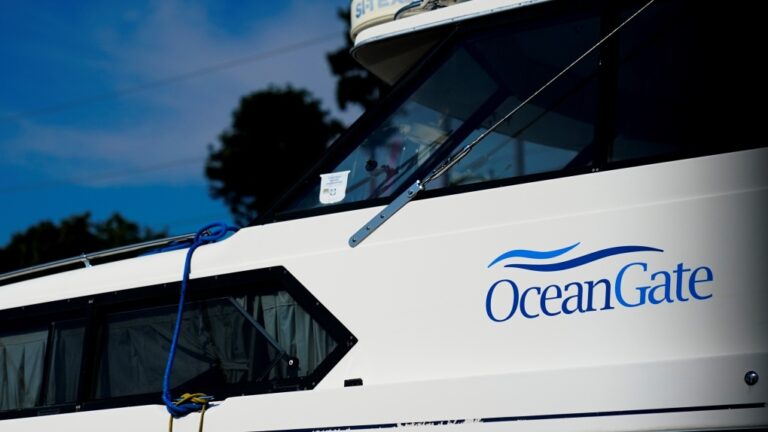 A boat with the OceanGate logo is parked on a lot near the OceanGate offices Thursday, June 22, 2023, in Everett, Wash. (AP Photo/Lindsey Wasson)