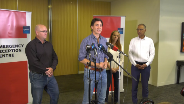 ‘Incredibly difficult times’: PM Justin Trudeau visits N.W.T. wildfire evacuees at reception centre in Edmonton