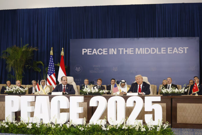 U.S. President Donald Trump and Egyptian President Abdel Fattah al-Sissi, left, attend the signature ceremony at the Gaza International Peace Summit, in Sharm el-Sheikh, Egypt, Monday, Oct.13 2025. (Yoan Valat / AP)