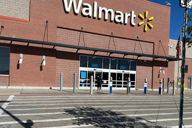 FILE - A shopper heads into a Walmart store Thursday, Oct. 16, 2025, in Englewood, Colo. (AP Photo/David Zalubowski, File) © The Associated Press